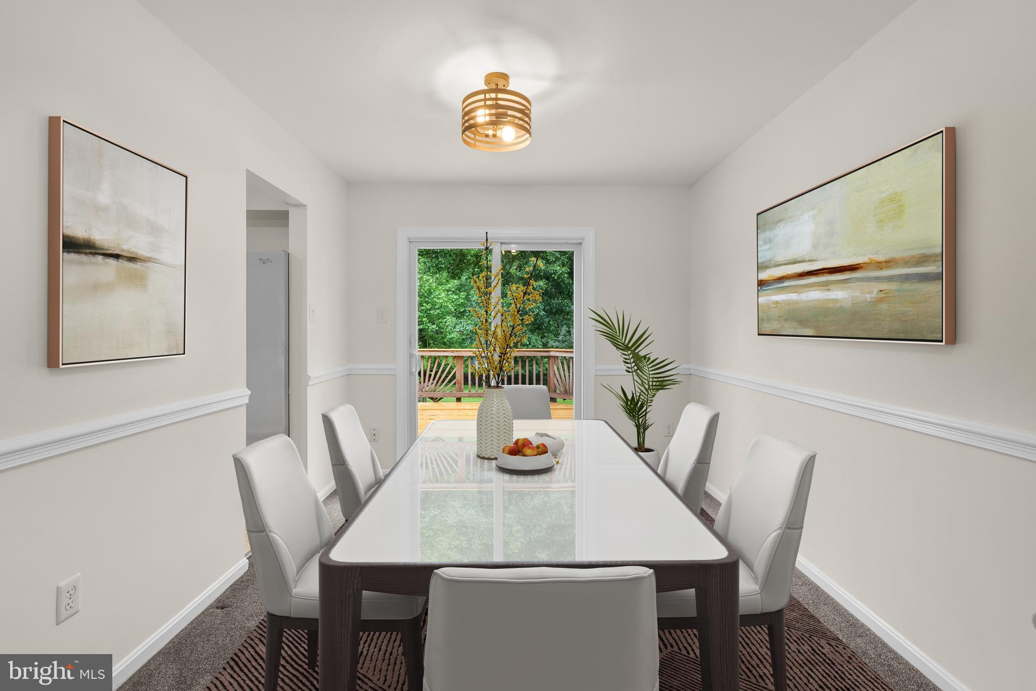 17513 Longview Lane Olney, MD 20832 - Photo 16 of 51 a view of a dining room with furniture window and wooden floor