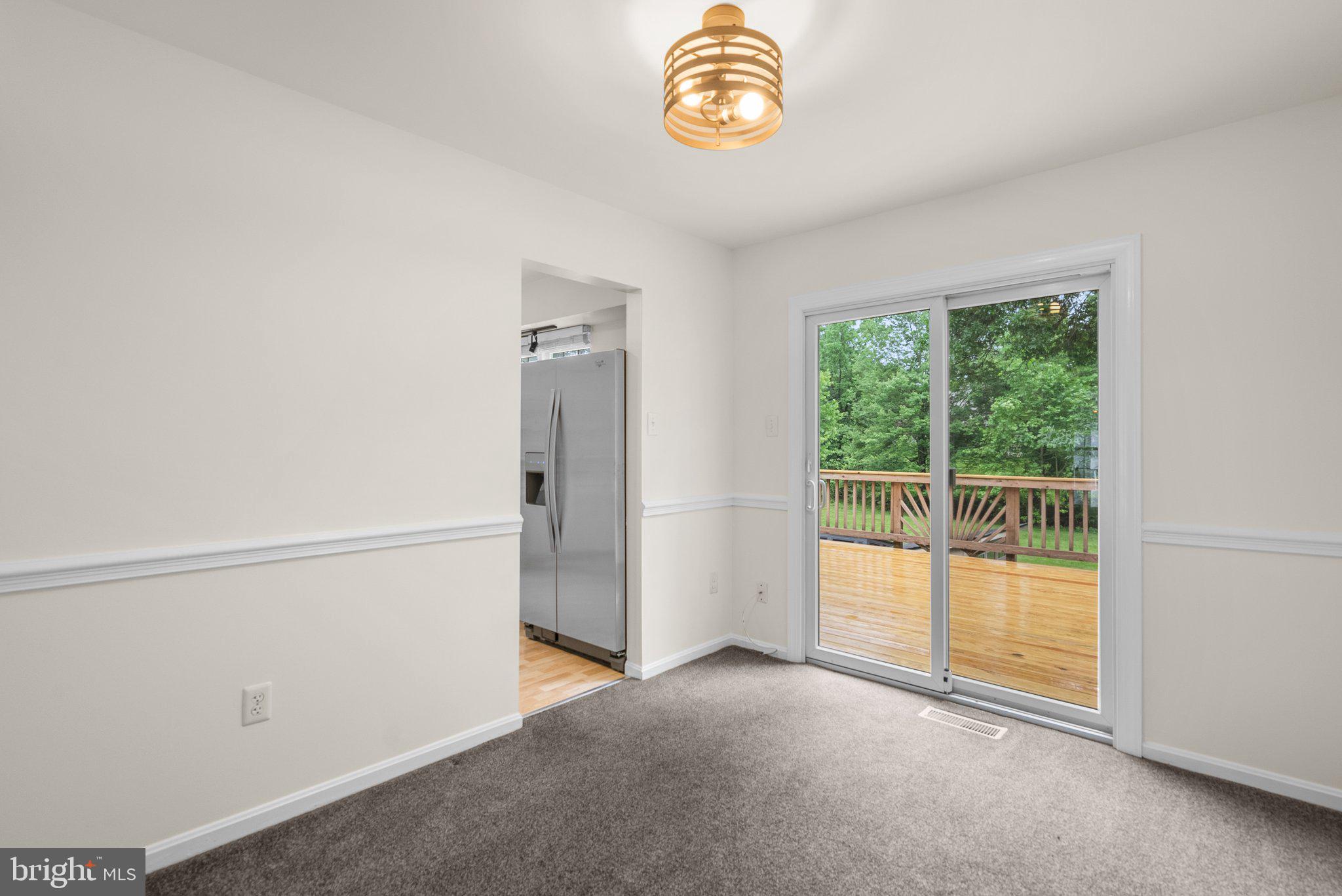 17513 Longview Lane Olney, MD 20832 - Photo 18 of 51 a view of empty room with floor to ceiling window