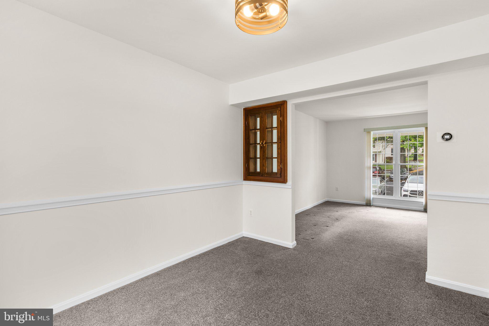 17513 Longview Lane Olney, MD 20832 - Photo 20 of 51 an empty room with windows