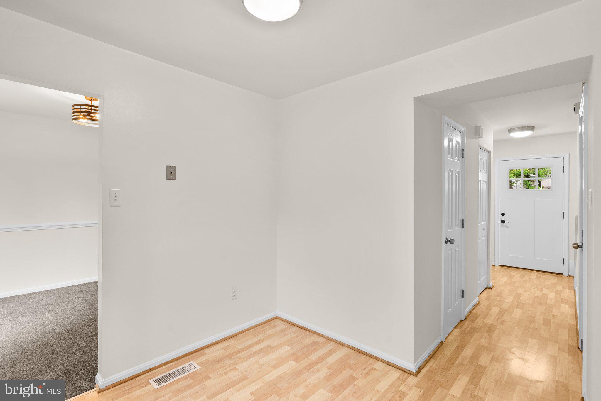 17513 Longview Lane Olney, MD 20832 - Photo 23 of 51 a view of a hallway with wooden floor