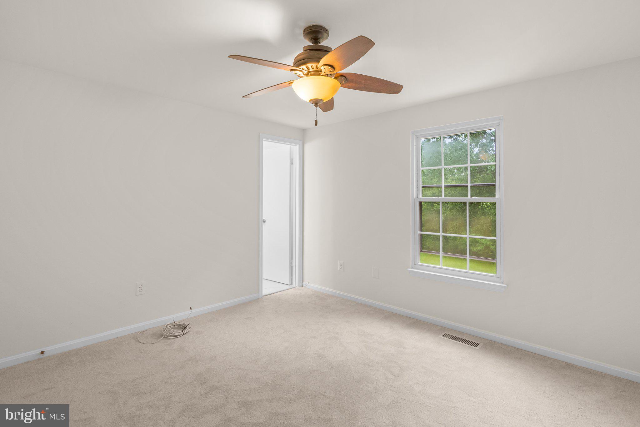 17513 Longview Lane Olney, MD 20832 - Photo 27 of 51 an empty room with a window
