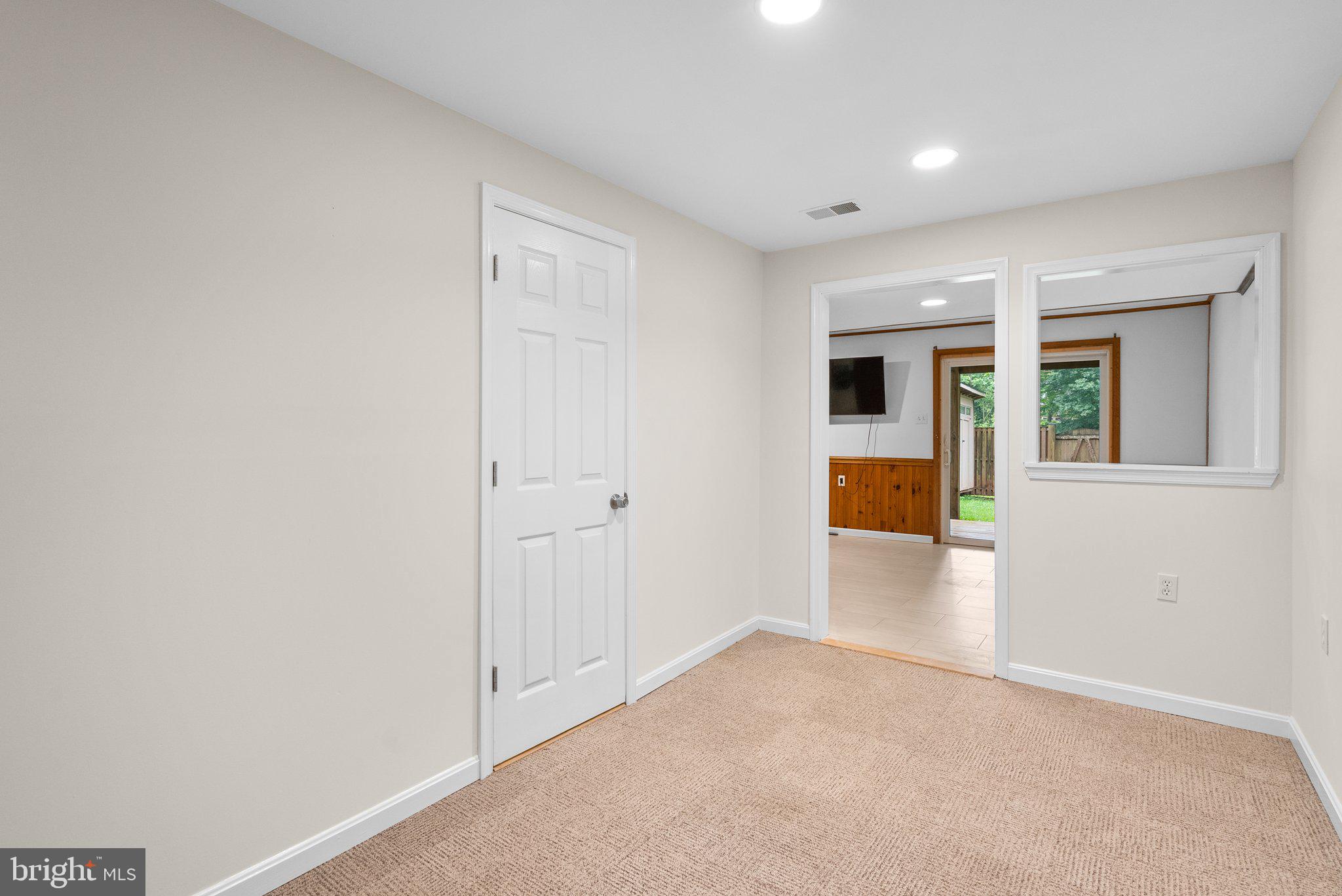 17513 Longview Lane Olney, MD 20832 - Photo 39 of 51 wooden floor in an empty room and a window