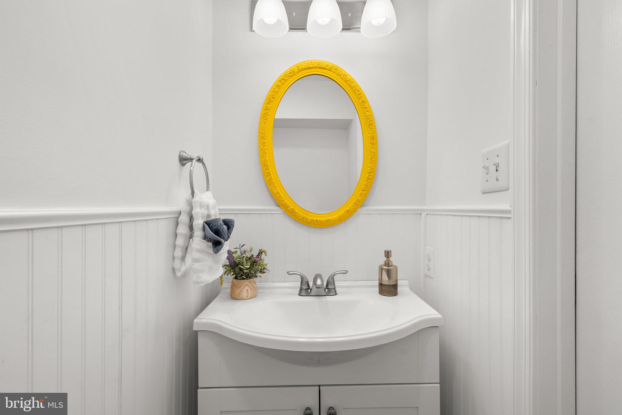 17513 Longview Lane Olney, MD 20832 - Photo 4 of 51 a bathroom with a sink and a mirror