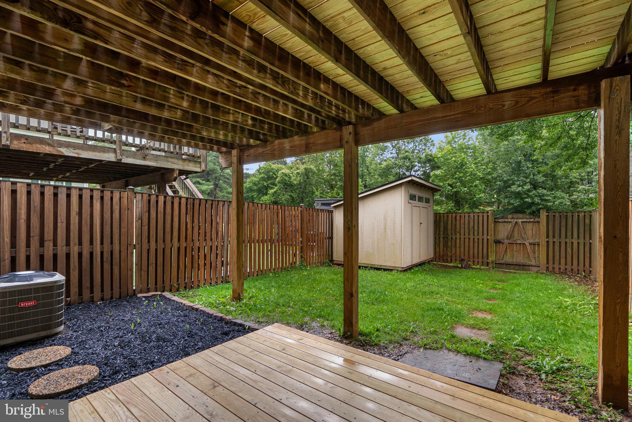 17513 Longview Lane Olney, MD 20832 - Photo 43 of 51 a view of a backyard with wooden fence