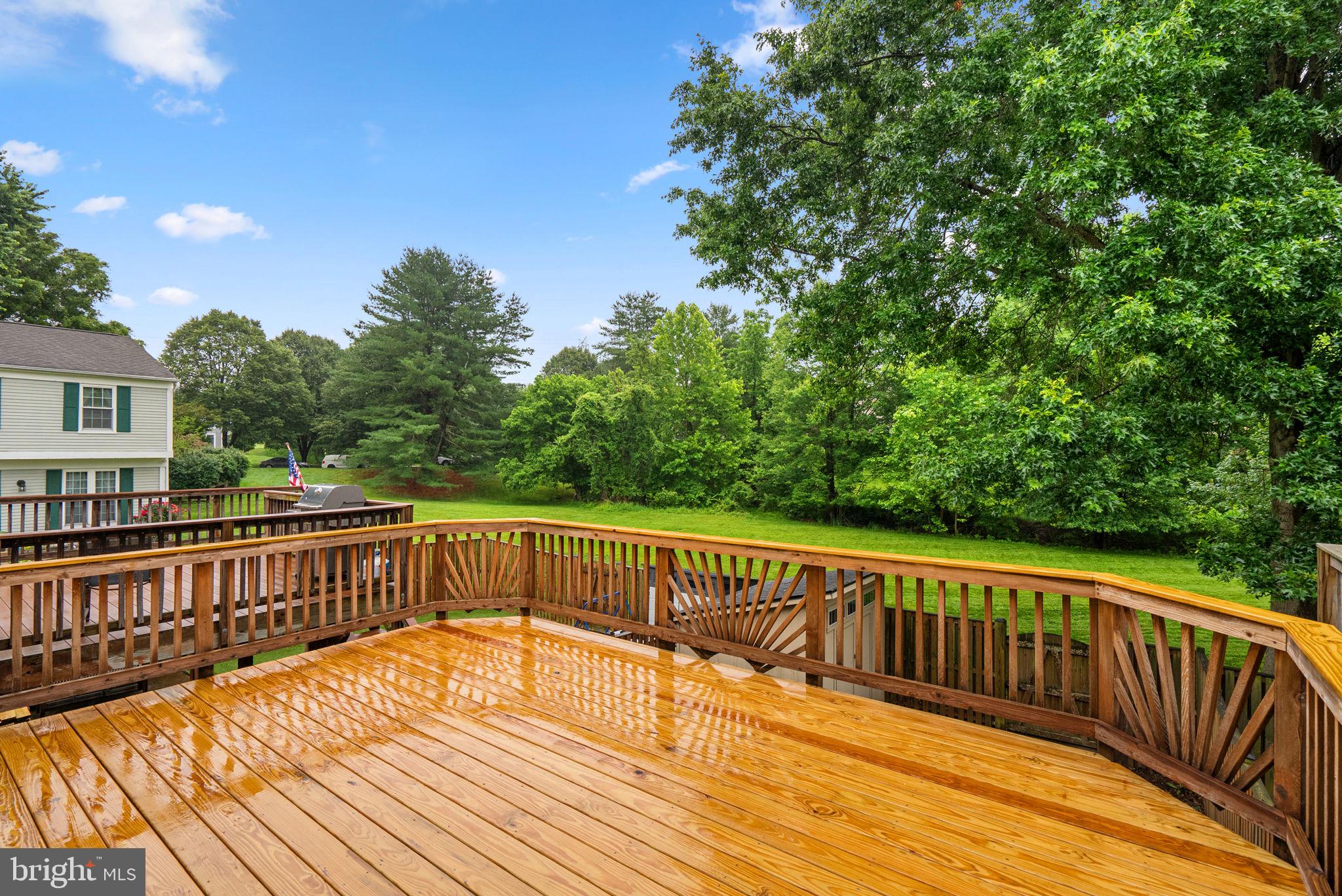 17513 Longview Lane Olney, MD 20832 - Photo 5 of 51 a view of balcony with wooden floor and seating space