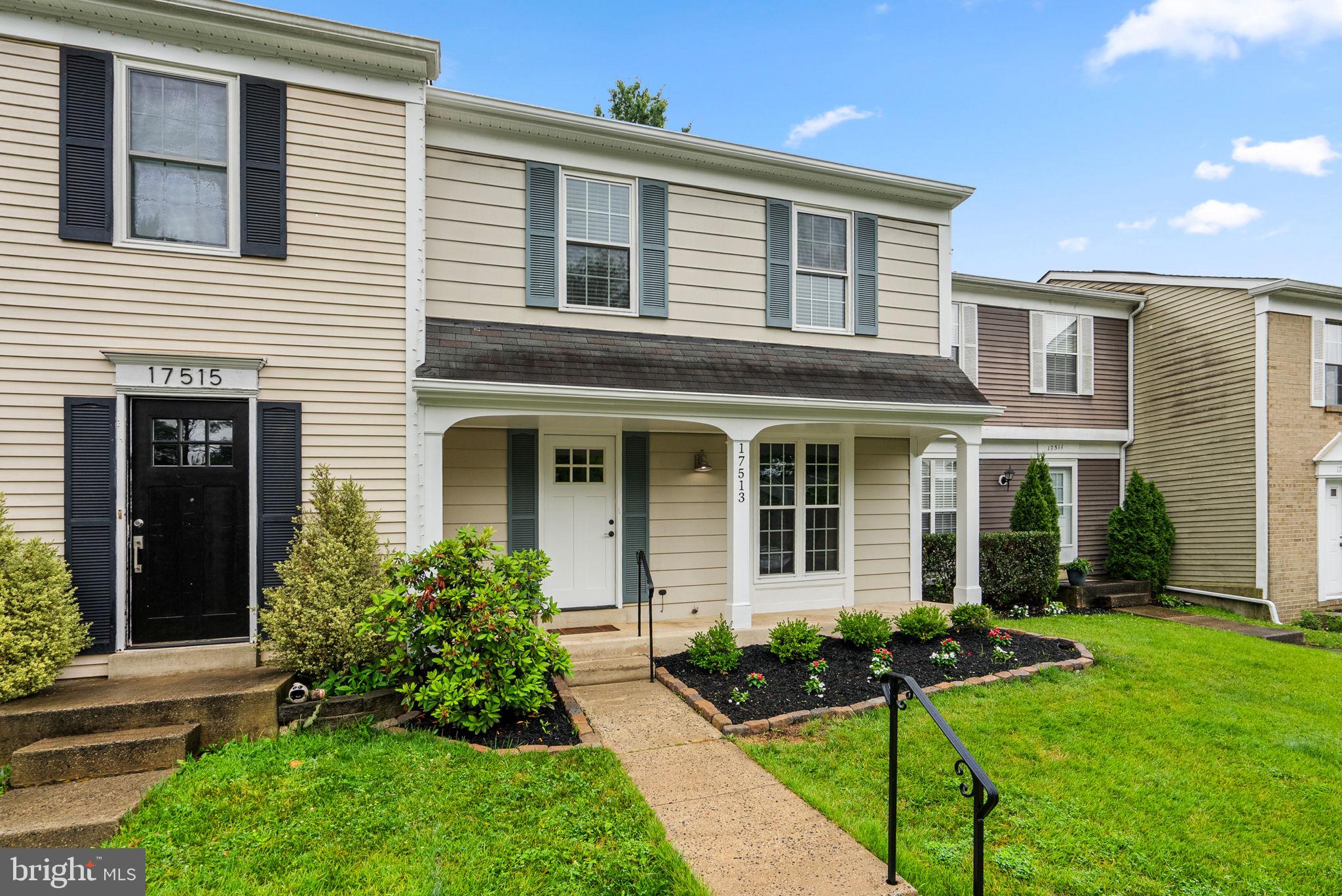17513 Longview Lane Olney, MD 20832 - Photo 8 of 51 a front view of a house with garden