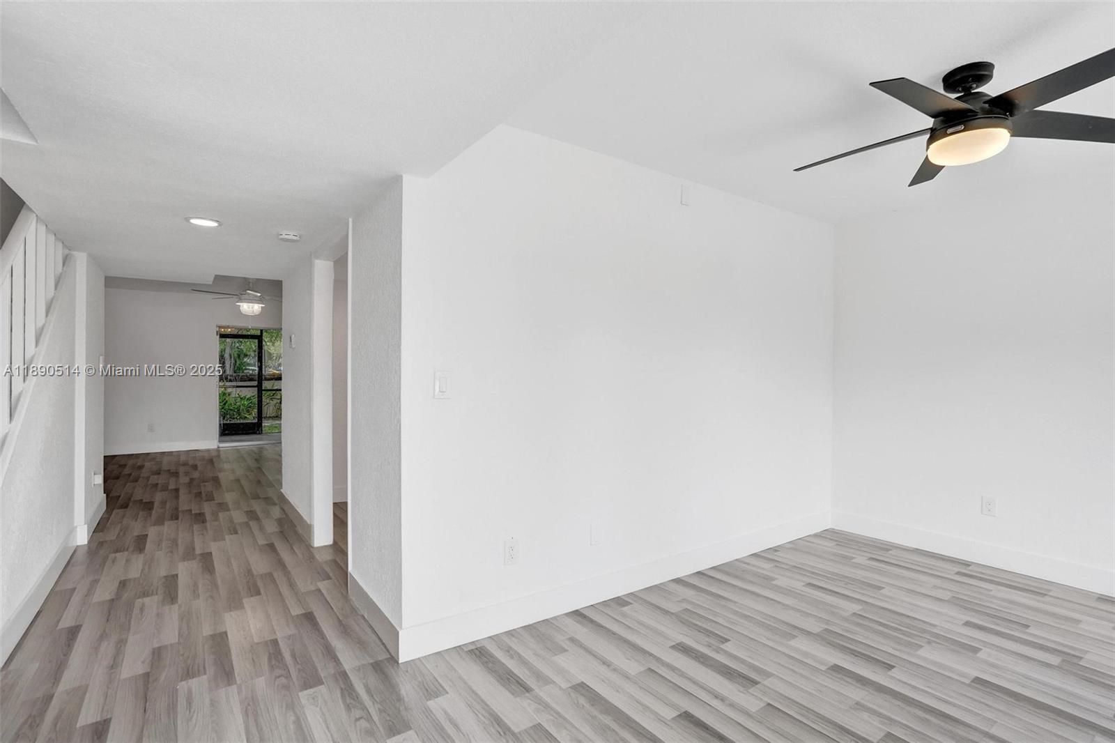 4026 Inverrary Drive, Unit 8A Lauderhill, FL 33319 - Photo 14 of 50 a view of empty room with wooden floor