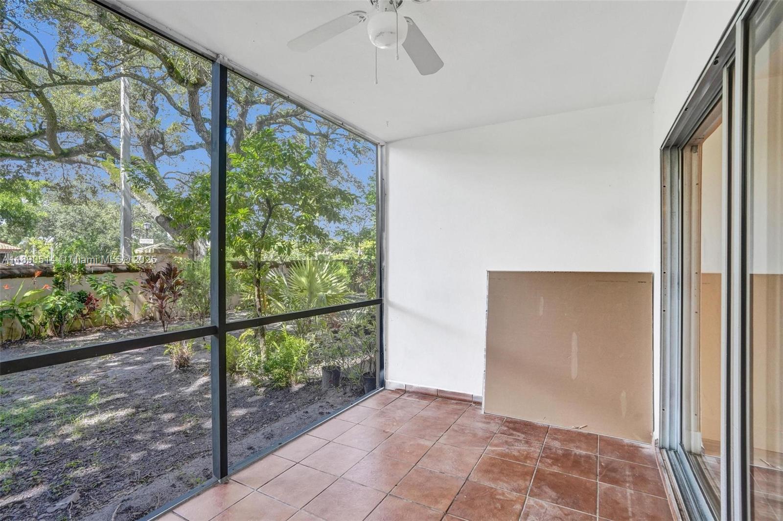 4026 Inverrary Drive, Unit 8A Lauderhill, FL 33319 - Photo 21 of 50 wooden floor in an empty room with a window