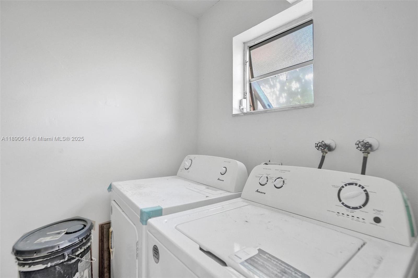 4026 Inverrary Drive, Unit 8A Lauderhill, FL 33319 - Photo 22 of 50 a utility room with dryer and washer