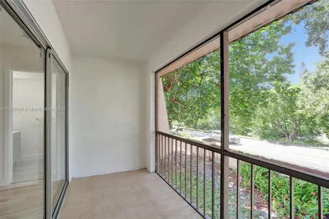 a view of a porch with a large window