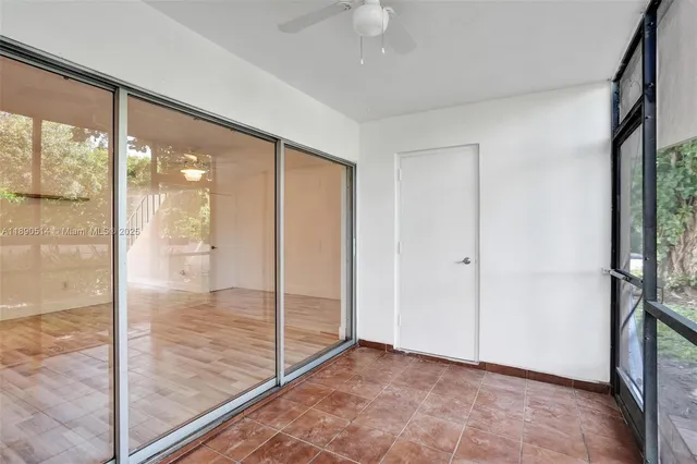 a view of an empty room and window