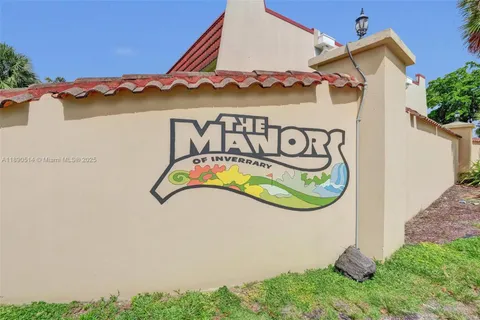 a sign that is on the side of a building