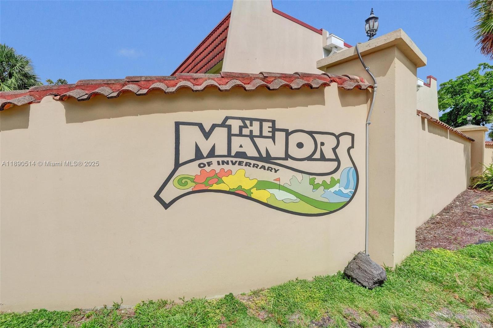 4026 Inverrary Drive, Unit 8A Lauderhill, FL 33319 - Photo 50 of 50 a sign that is on the side of a building