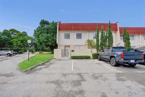 a car parked in front of a house
