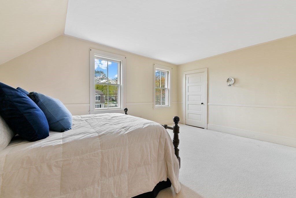 241 Central Street Hingham, MA 02043 - Photo 14 of 24 a bedroom with a bed and a window