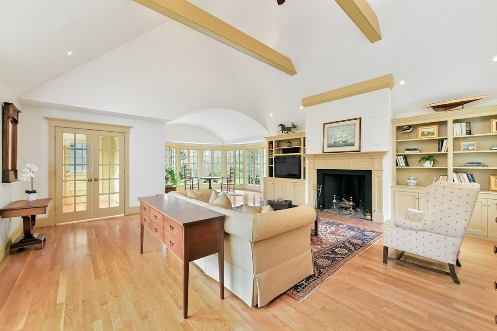 241 Central Street Hingham, MA 02043 - Photo 3 of 24 a living room with furniture and a fireplace