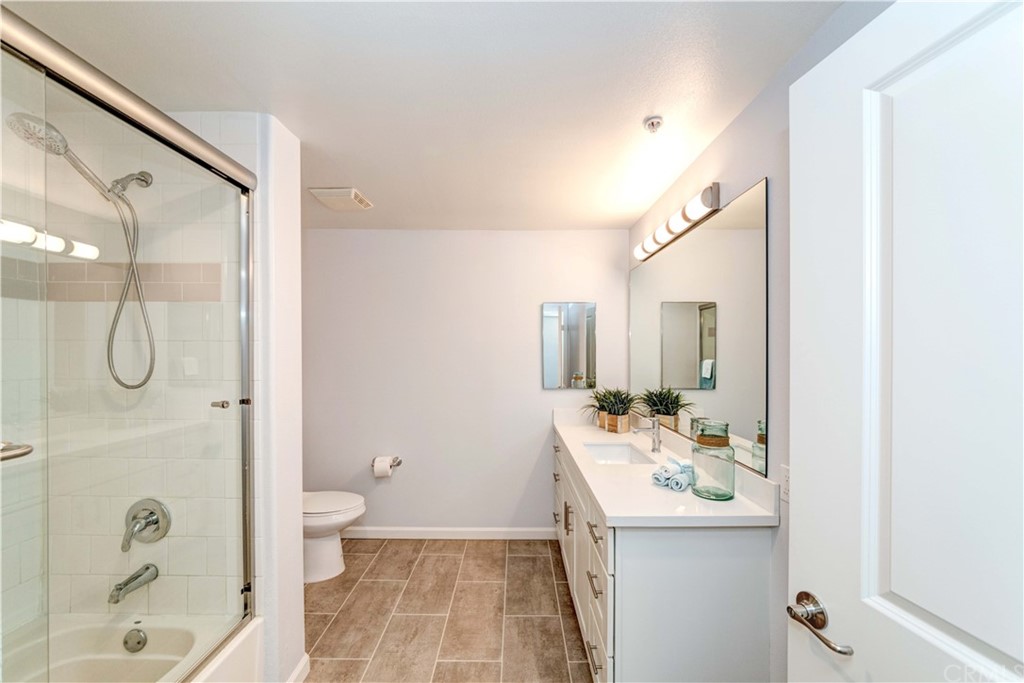 100 South Alameda Street, Unit 210 Los Angeles, CA 90012 - Photo 11 of 52 a bathroom with a sink toilet and shower