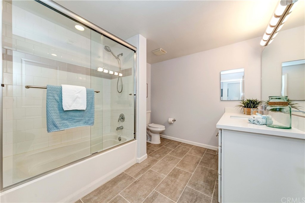 100 South Alameda Street, Unit 210 Los Angeles, CA 90012 - Photo 12 of 52 a bathroom with a sink a toilet and shower