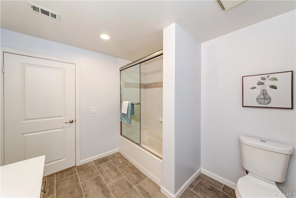 100 South Alameda Street, Unit 210 Los Angeles, CA 90012 - Photo 14 of 52 a bathroom with a shower and toilet