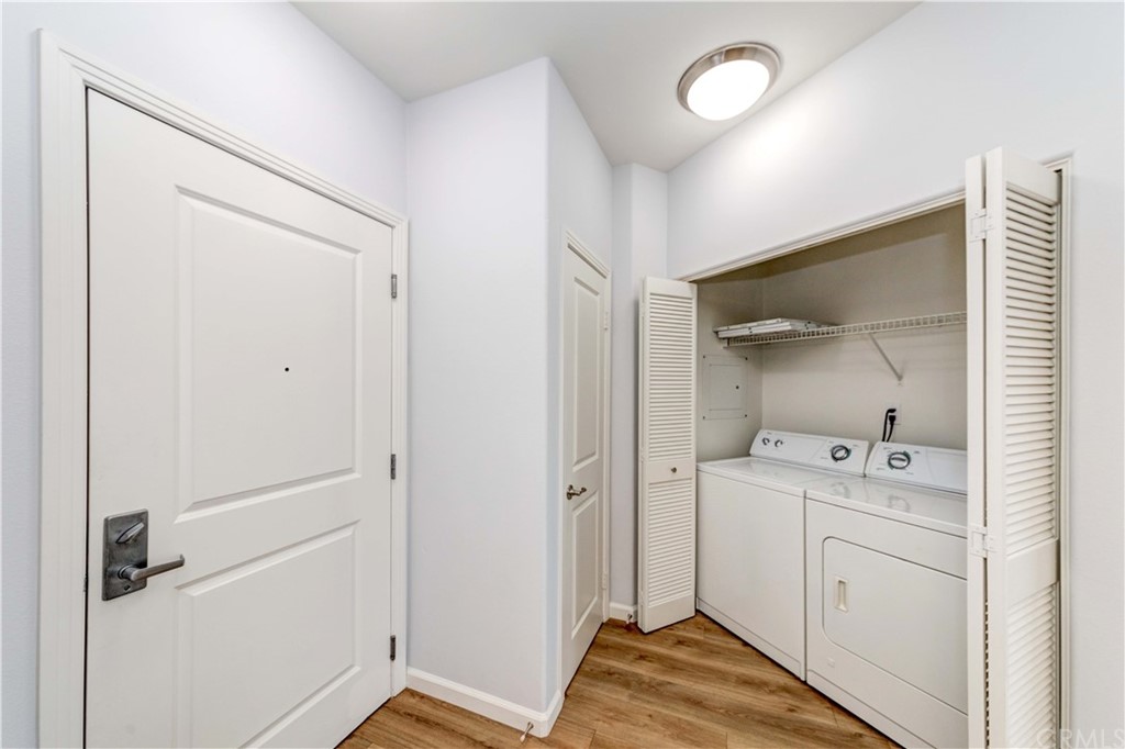 100 South Alameda Street, Unit 210 Los Angeles, CA 90012 - Photo 22 of 52 a view of a storage & utility room with two washing machine