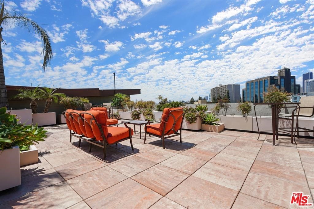 100 South Alameda Street, Unit 210 Los Angeles, CA 90012 - Photo 42 of 52 a view of a terrace with sitting area