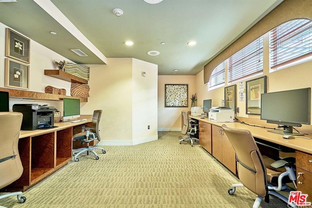 100 South Alameda Street, Unit 210 Los Angeles, CA 90012 - Photo 46 of 52 a view of a workspace with furniture