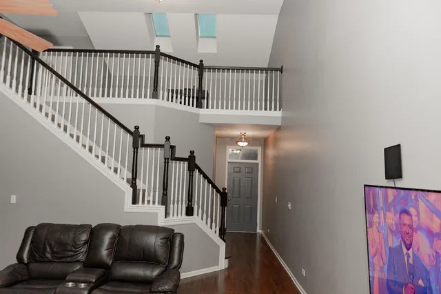 a view of entryway with wooden floor