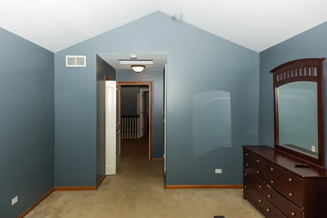 a view of hallway with mirror