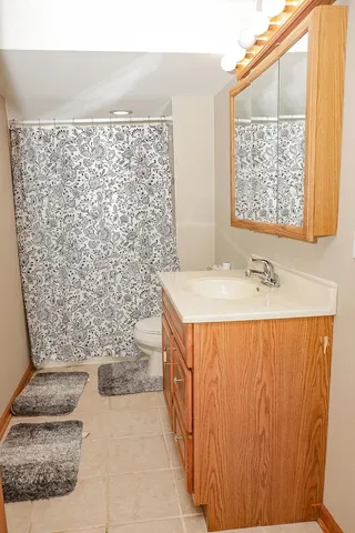 an aerial view of a house with a garden