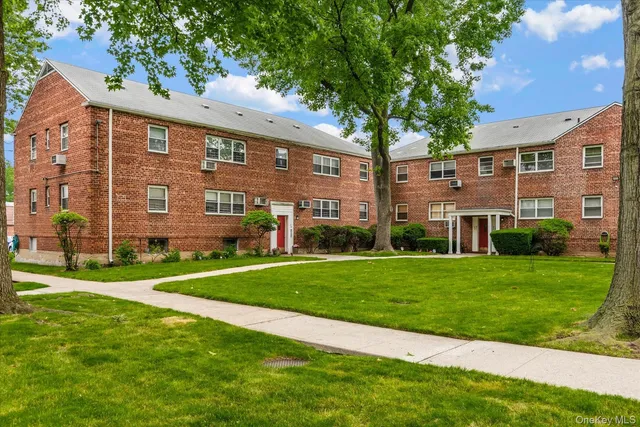 a view of a big yard next to a building