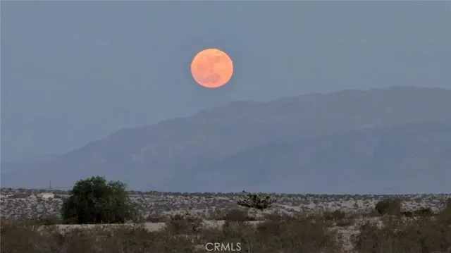 a view of mountain with lake view