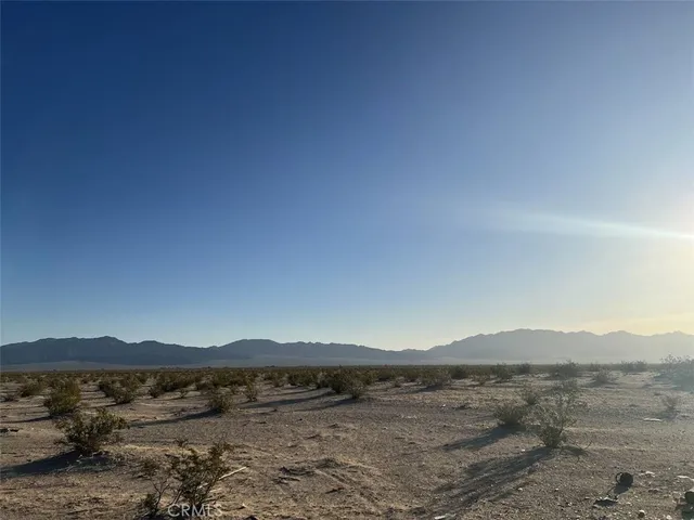 a view of lake and mountain