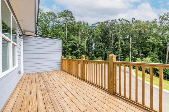 a view of house with backyard