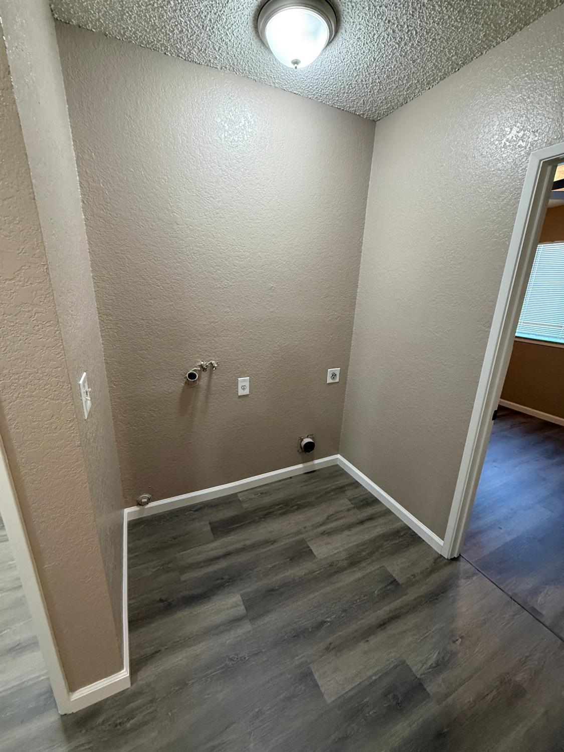 460 South Dearing Avenue Fresno, CA 93702 - Photo 13 of 23 a view of empty room with wooden floor