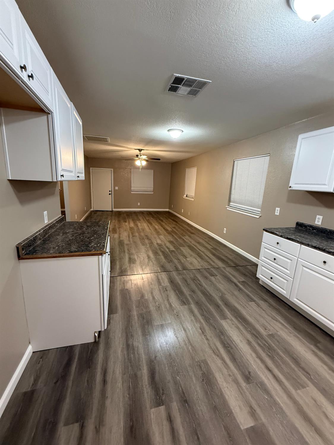 460 South Dearing Avenue Fresno, CA 93702 - Photo 16 of 23 a kitchen with granite countertop a stove and a sink