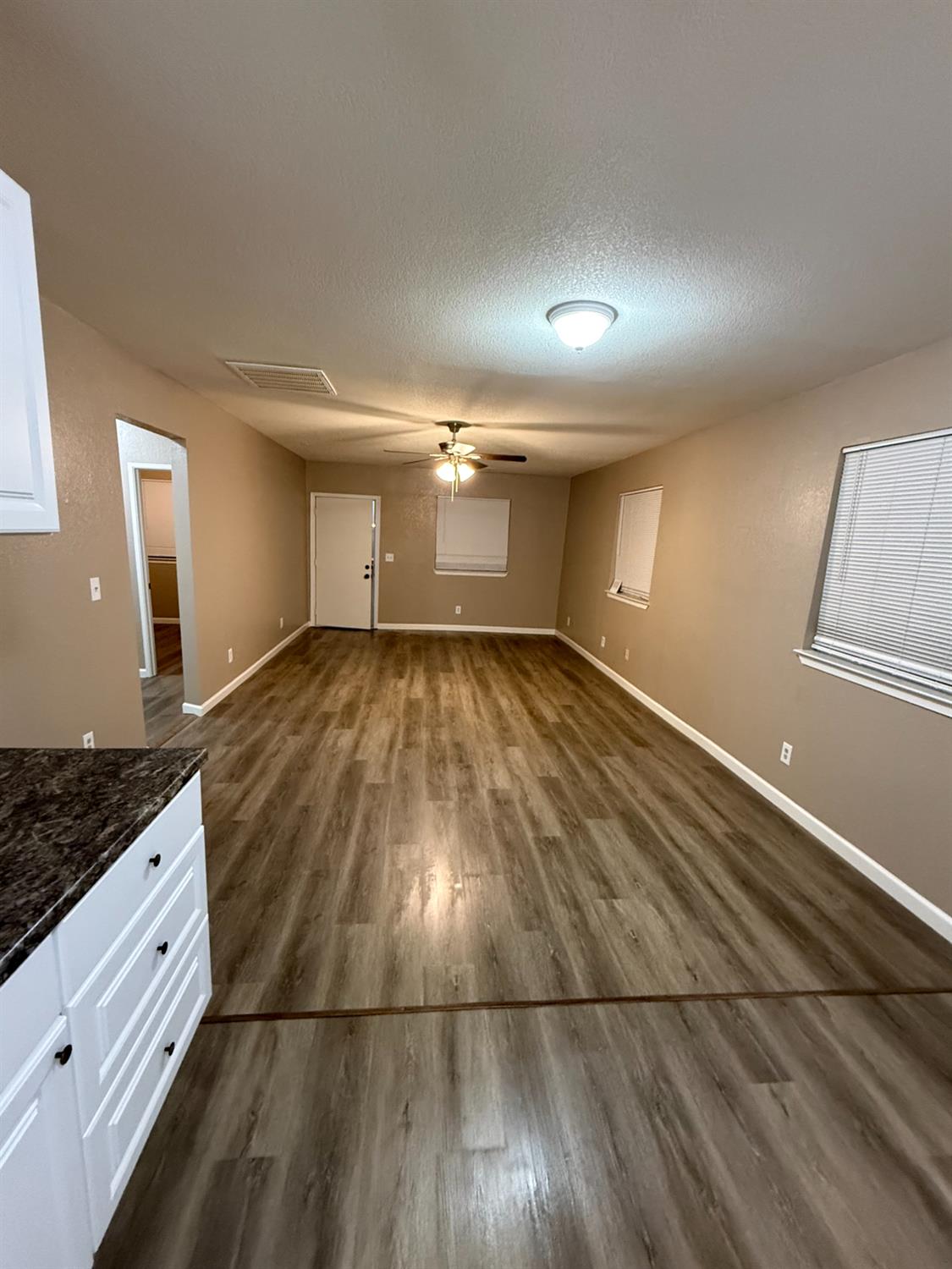 460 South Dearing Avenue Fresno, CA 93702 - Photo 17 of 23 a view of a room with wooden floor