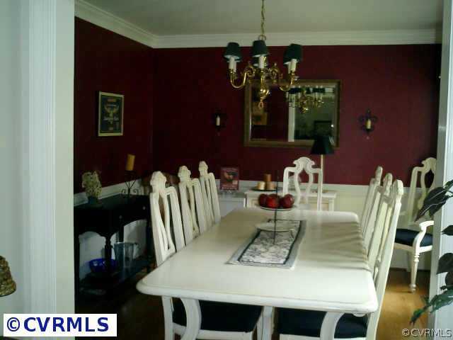 5217 Rock Harbour Road Midlothian, VA 23112 - Photo 4 of 6 a view of a dining room with furniture