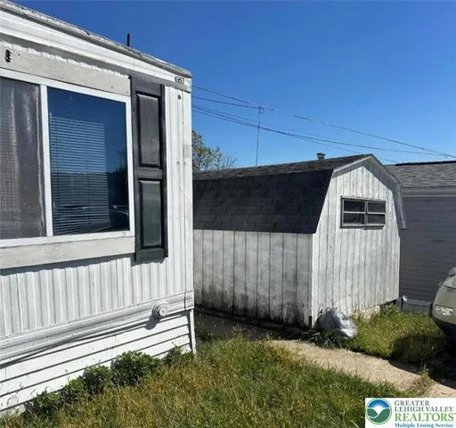 a view of a back yard of the house