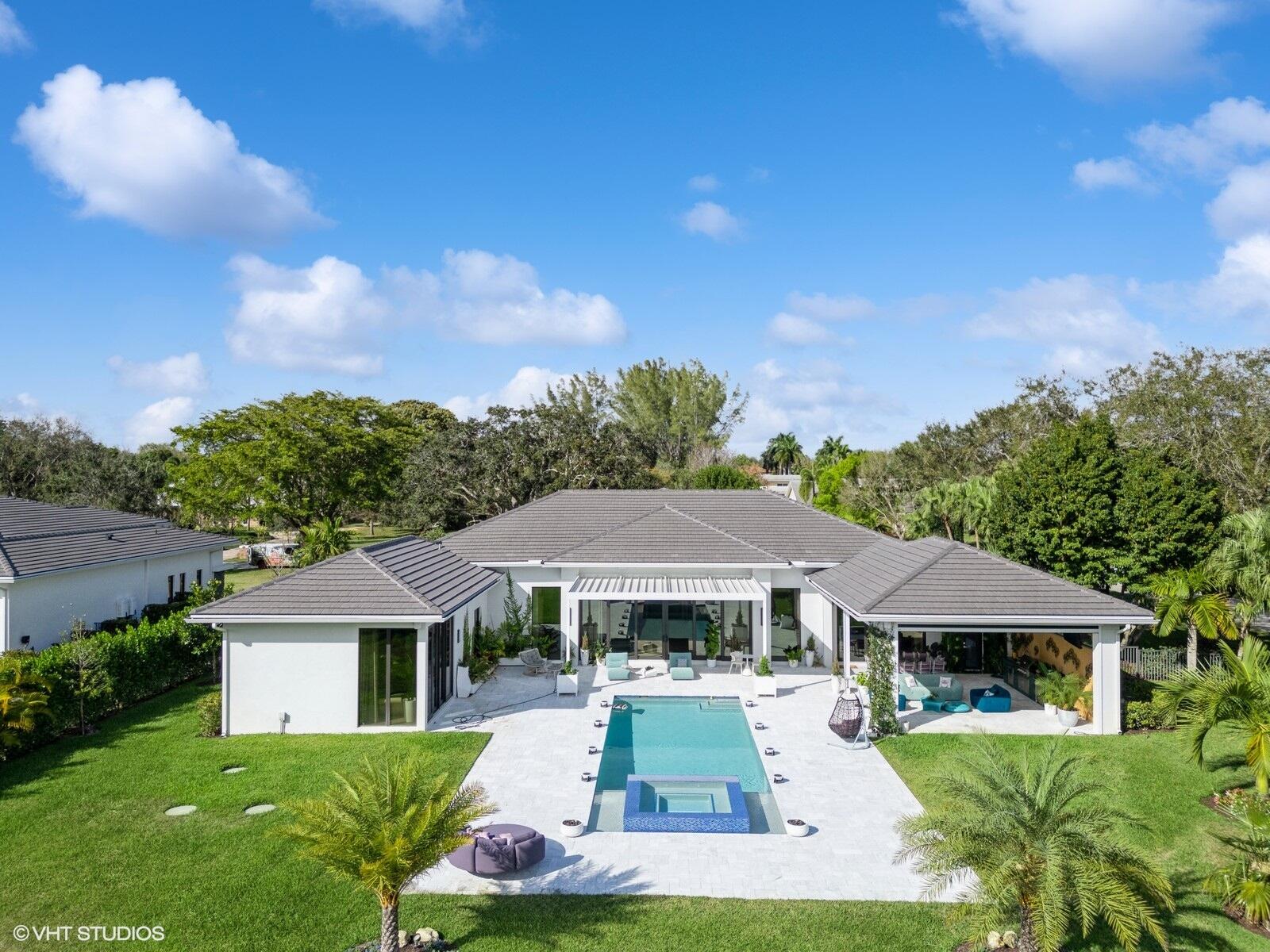 8533 North Native Dancer Road Palm Beach Gardens, FL 33418 - Photo 2 of 61 97_8533NativeDancerRdE_181011_AerialView