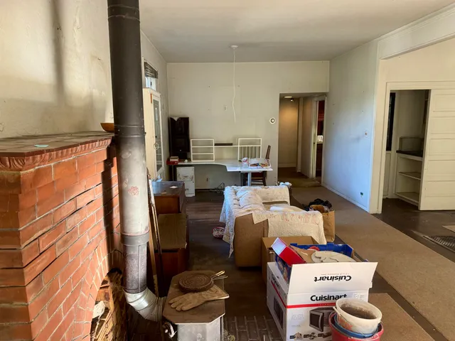 a kitchen that has a sink and a stove