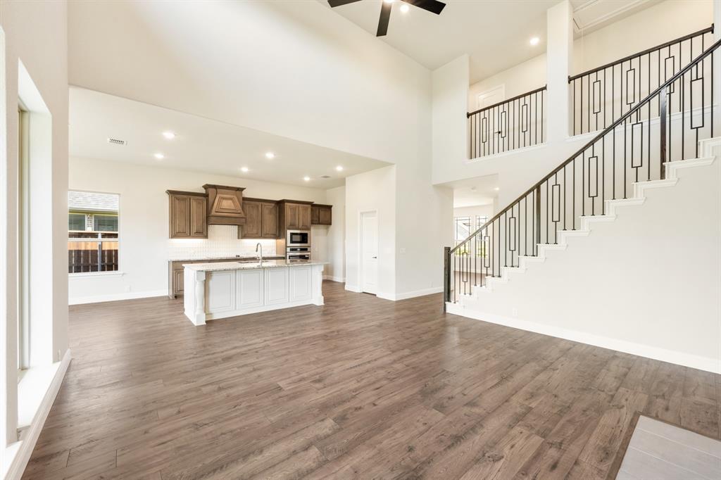 721 Seahawk Street Joshua, TX 76058 - Photo 17 of 40 a view of kitchen with wooden floor