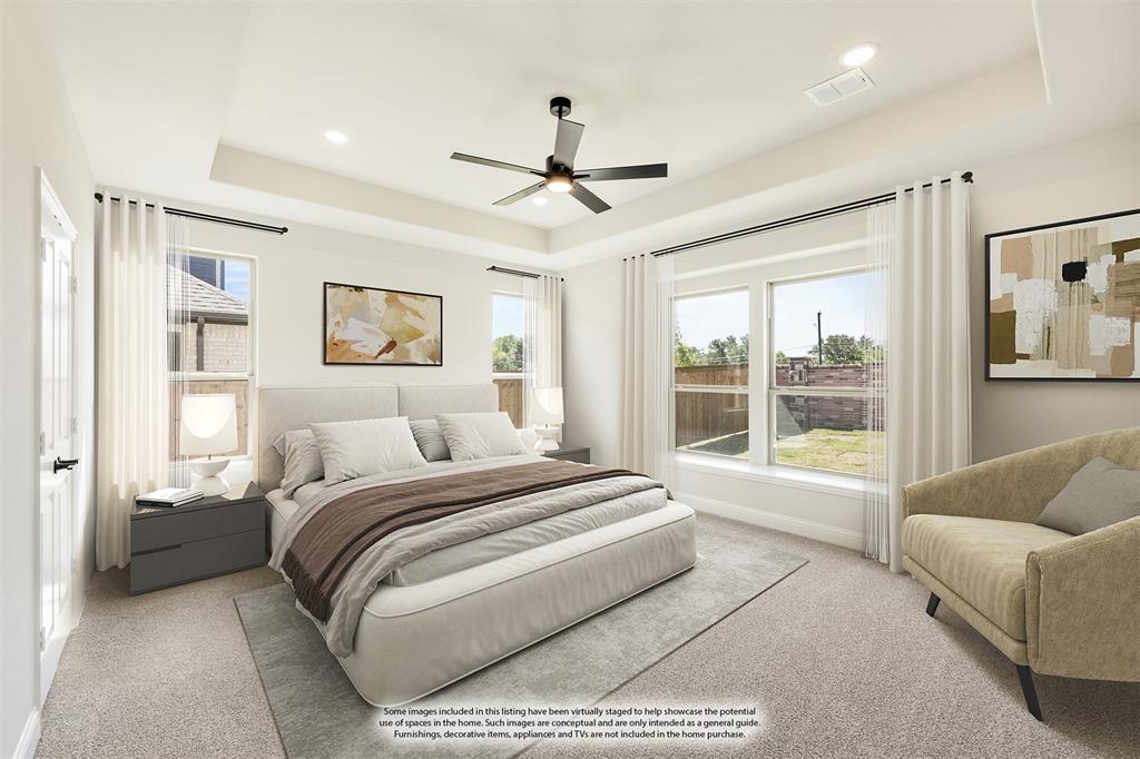 721 Seahawk Street Joshua, TX 76058 - Photo 20 of 40 a spacious bedroom with a large bed couch and windows