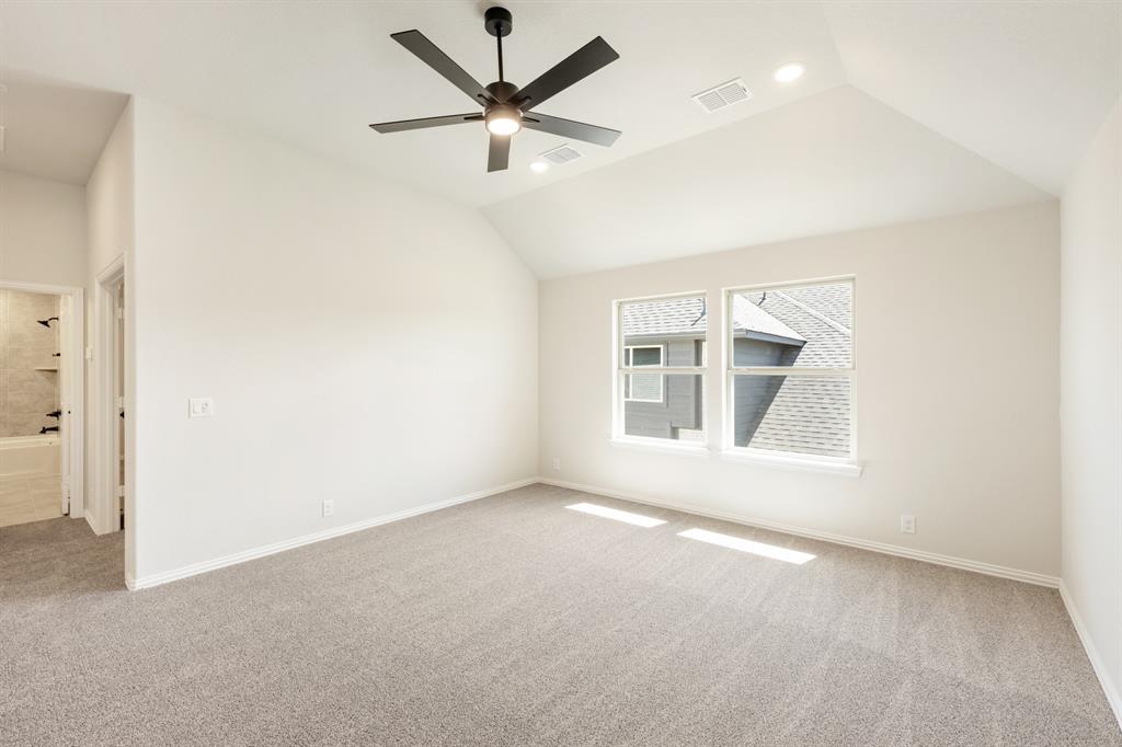 721 Seahawk Street Joshua, TX 76058 - Photo 29 of 40 an empty room with a window and a fan