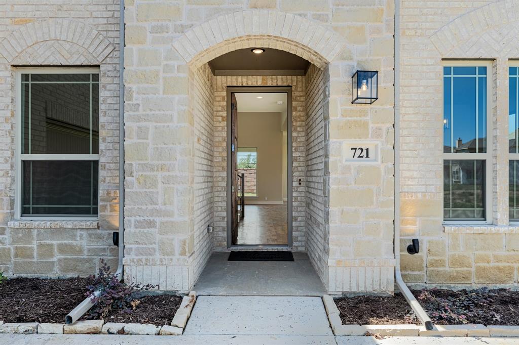 721 Seahawk Street Joshua, TX 76058 - Photo 3 of 40 a front view of a house with a shower