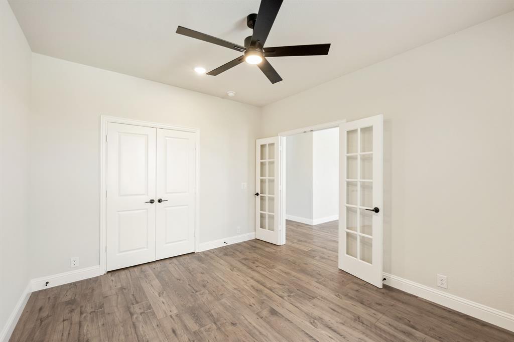 721 Seahawk Street Joshua, TX 76058 - Photo 6 of 40 a view of empty room with wooden floor