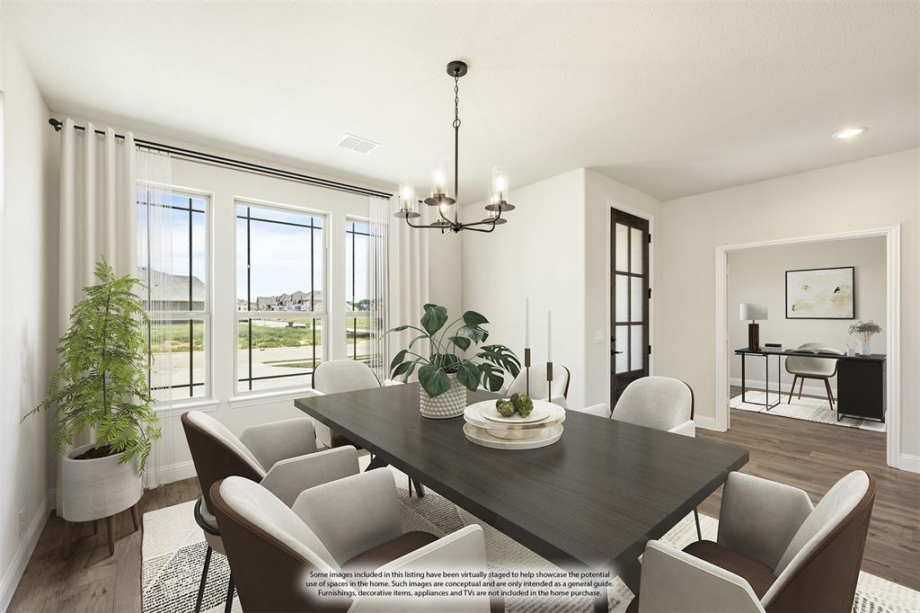 721 Seahawk Street Joshua, TX 76058 - Photo 8 of 40 a view of a dining room with furniture window and wooden floor
