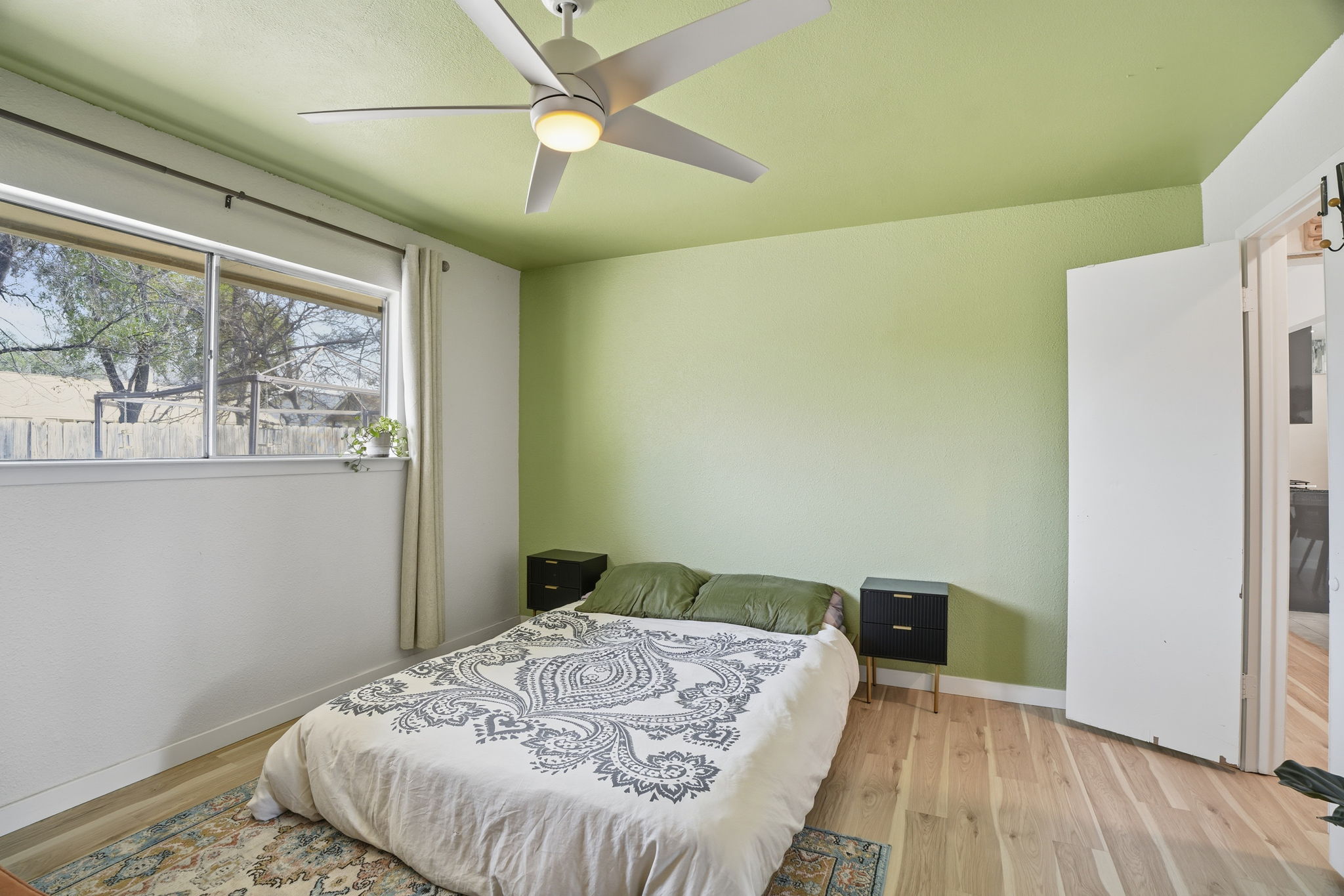 10305 Golden Quail Drive Austin, TX 78758 - Photo 15 of 39 a bedroom with a bed and a window