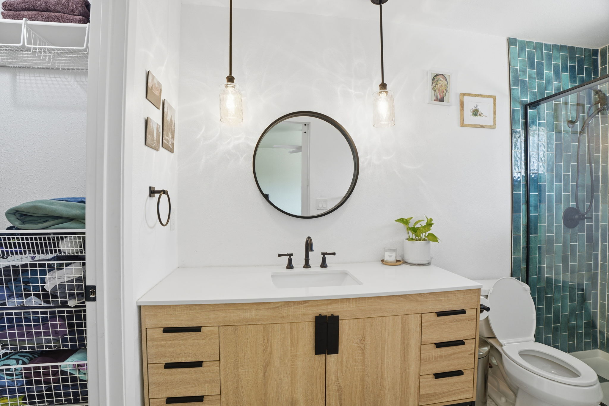 10305 Golden Quail Drive Austin, TX 78758 - Photo 19 of 39 a bathroom with a sink vanity mirror and toilet