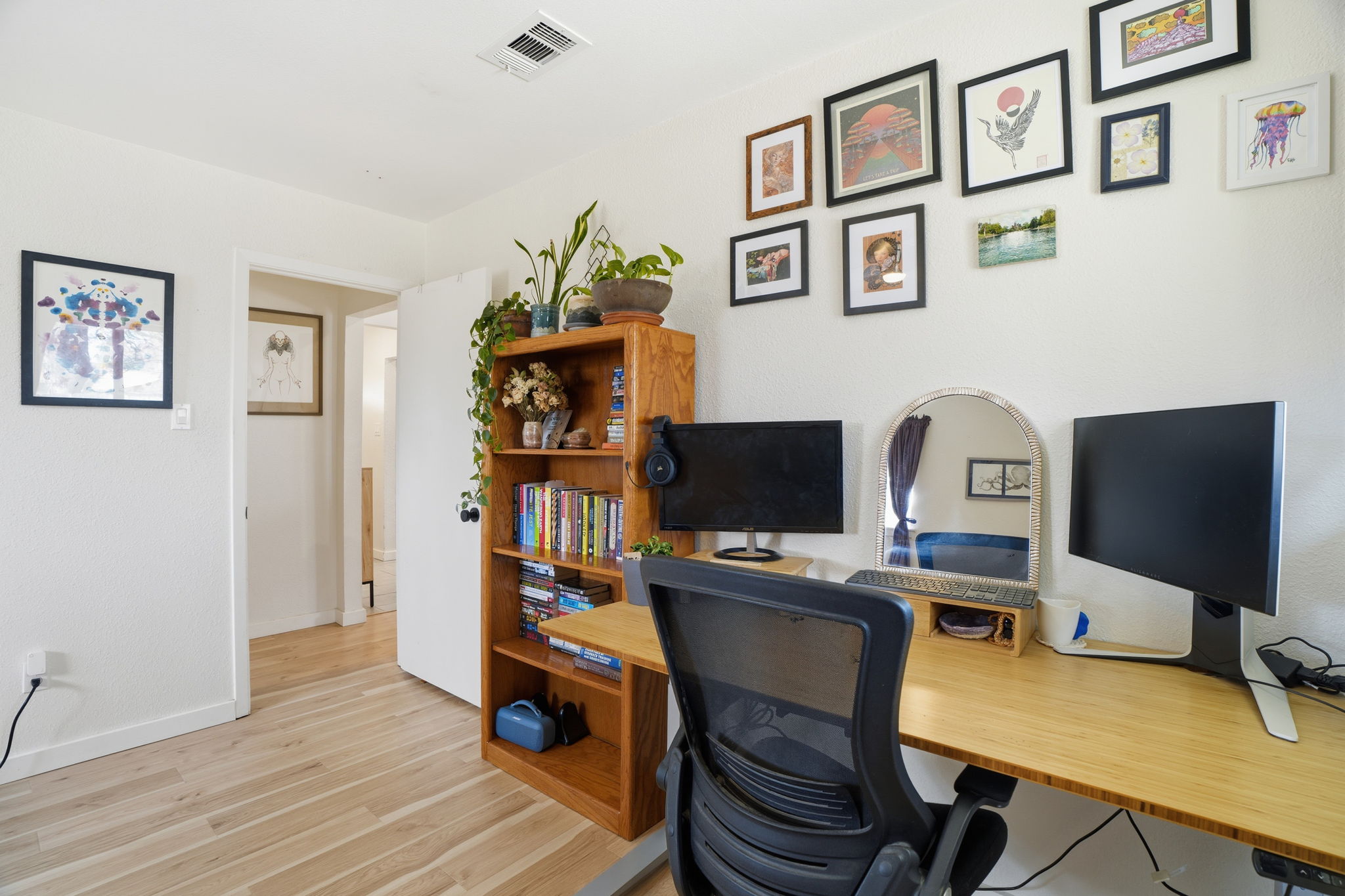 10305 Golden Quail Drive Austin, TX 78758 - Photo 30 of 39 a view of a workspace with furniture and wooden floor