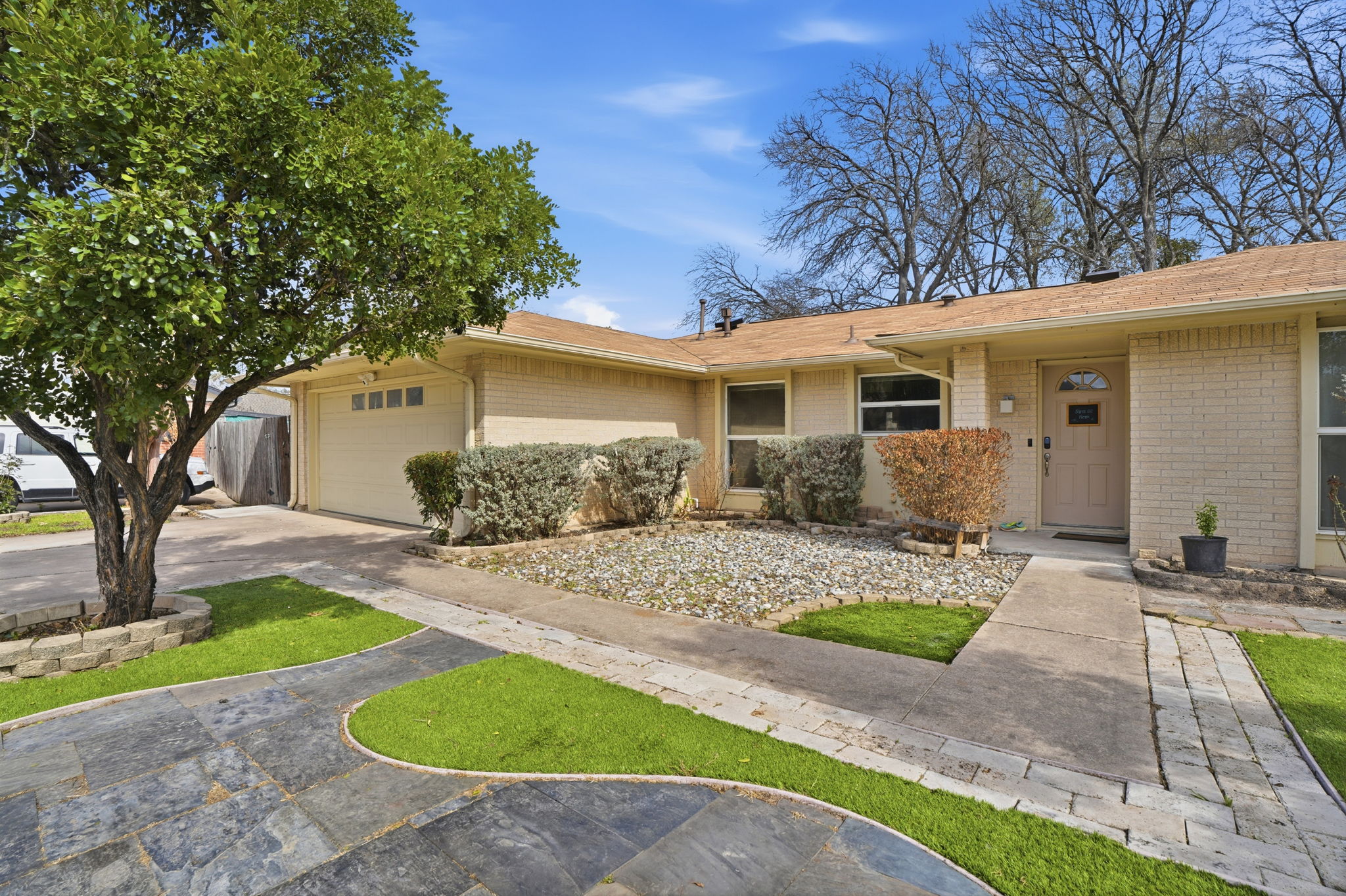 10305 Golden Quail Drive Austin, TX 78758 - Photo 3 of 39 a view of a yard in front of a house